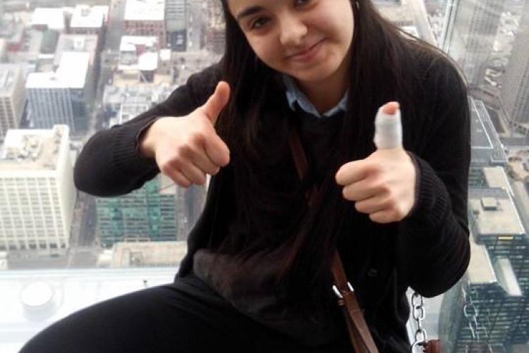 YES student with two thumbs up