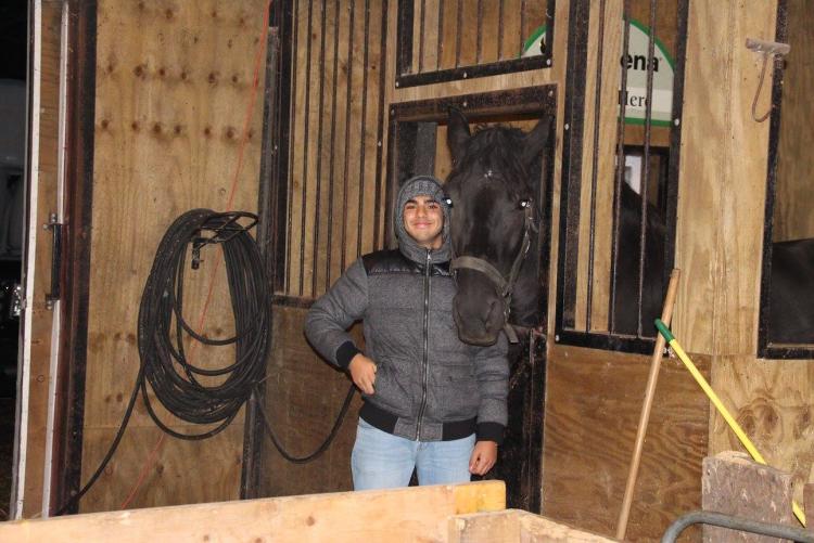 YES student in a barn